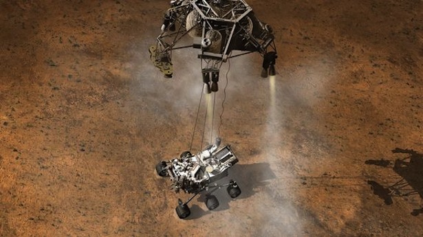 [Space Crane with Rover approaching Mars]